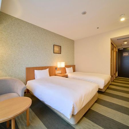 Hotel Granvia Wakayama Exterior photo A room at the hotel
