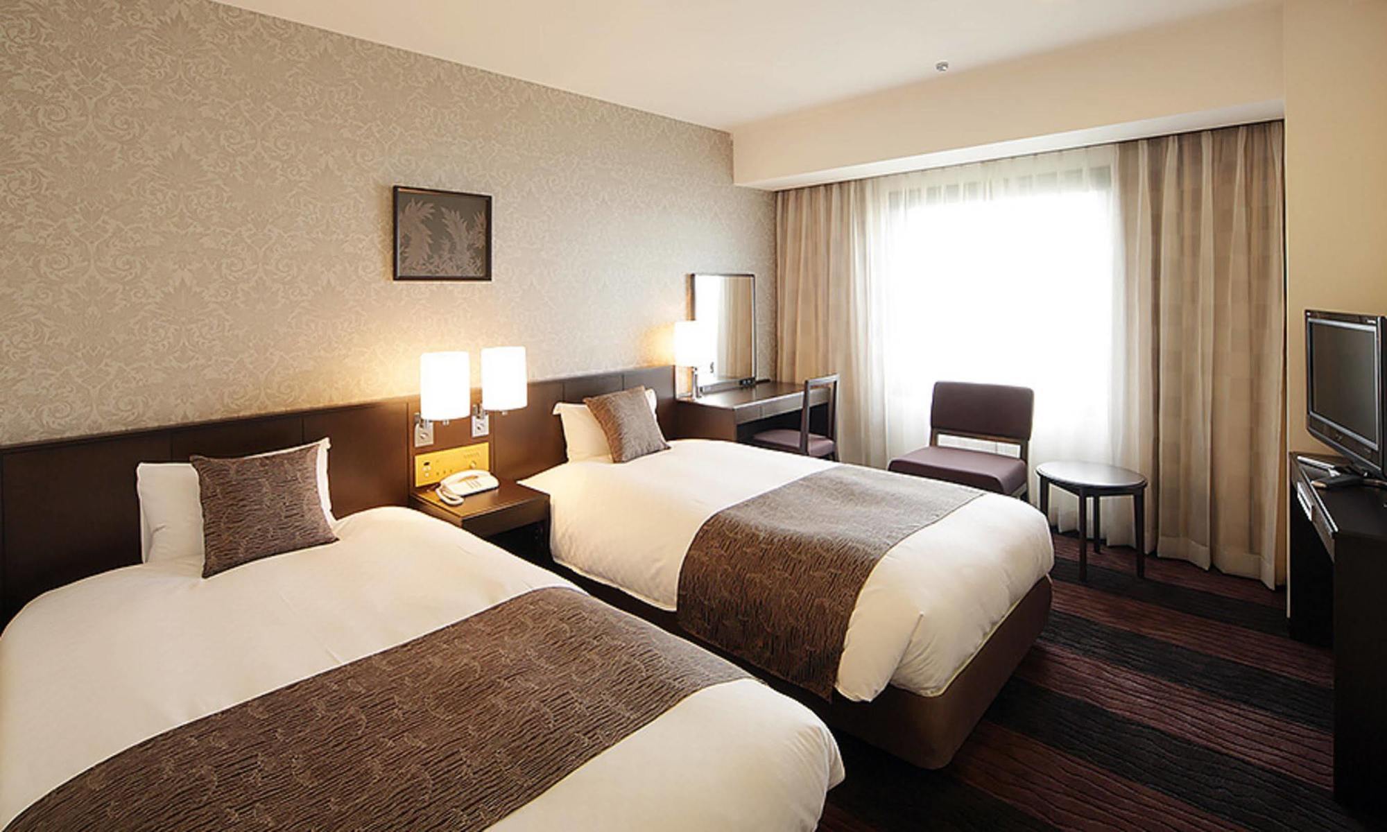Hotel Granvia Wakayama Exterior photo A room at the hotel